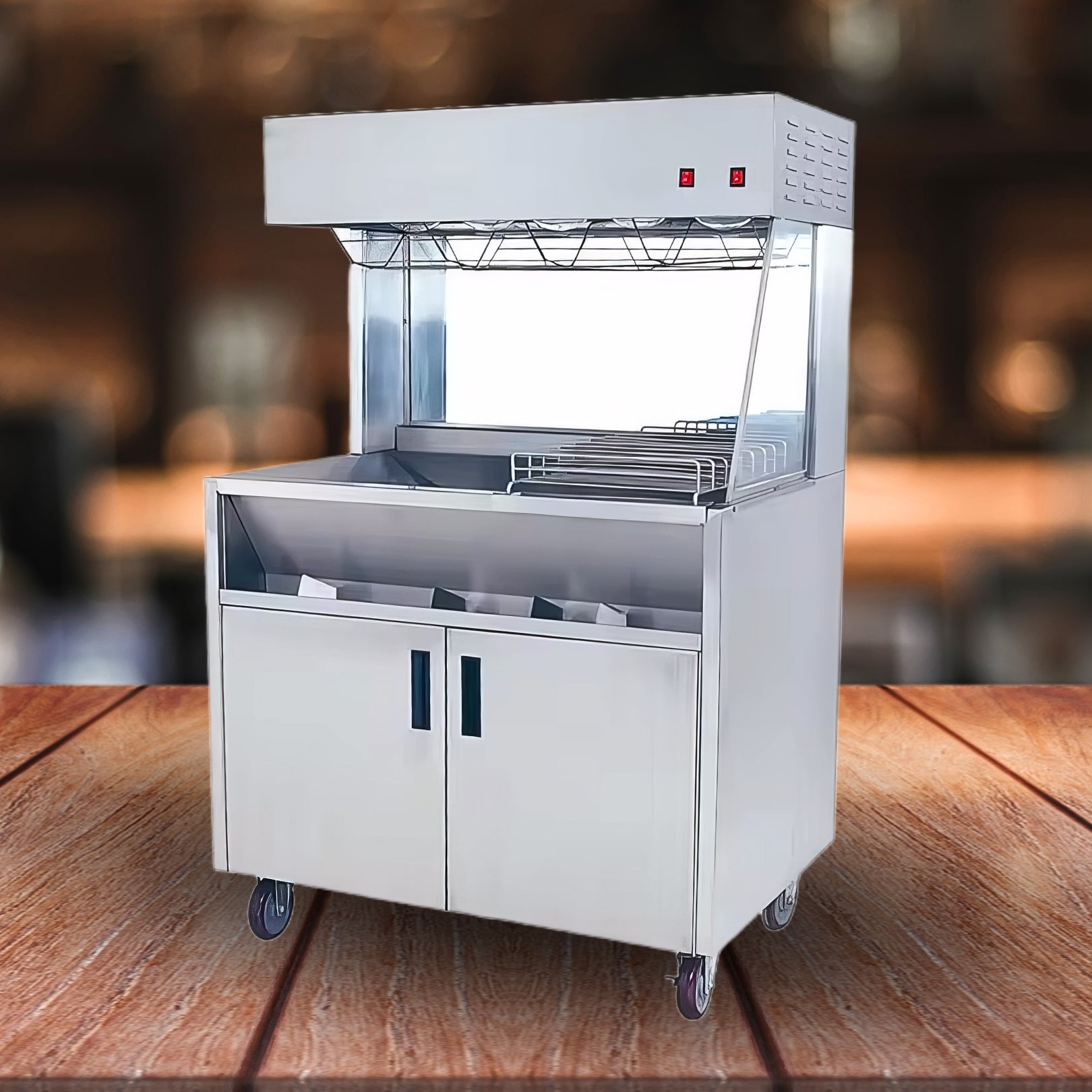 Commercial McDonald's-Style Stainless Steel Floor-Standing Fry Dump Station & Fried Food Warmer in commercial kitchen